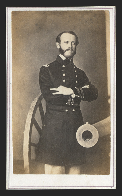[Dahlgren, John] Exceptional pair of carte-de-visite Photographs, one printed by Fredricks & Co of New York, a handsome 34 length image of Dahlgren as a lieutenant, posed
beside a rifled cannon. With an 1865 image by Brady of Washington, DC,