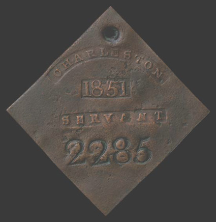 Slave Tag Scarce 1851 copper Slave Tag, ca. 1.5 x 1.5. Stamped Charleston  1851  Servant  2285. Flaw in stamping the A in Servant. Overall in Fine condition and a very
attractive example of the type. These tags were